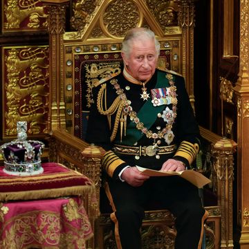 london, england may 10 prince charles, prince of wales reads the queen's speech next to her imperial state crown
